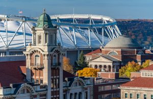 Aerial view of the Syracuse University campus zoomed in the roof of the stadium.